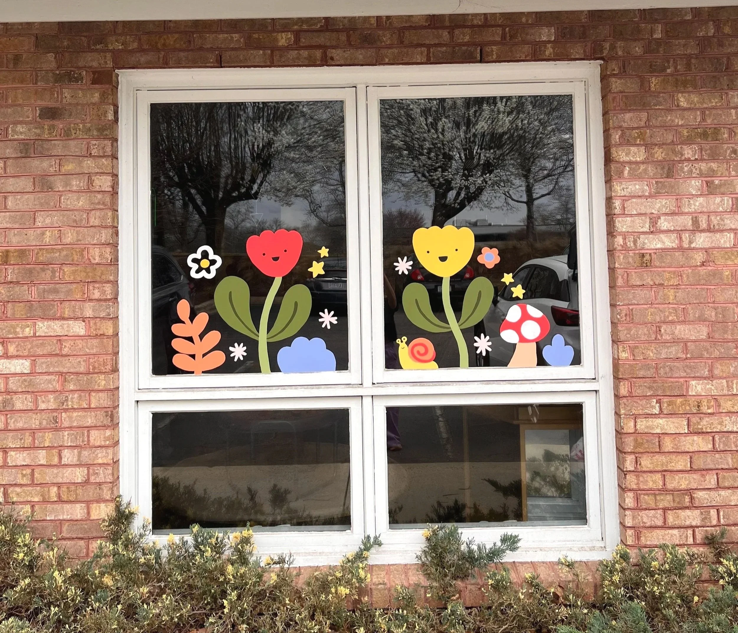  A fun spring-themed window painting for The Wonderlab, a STEM-based indoor play place in Durham, NC.  