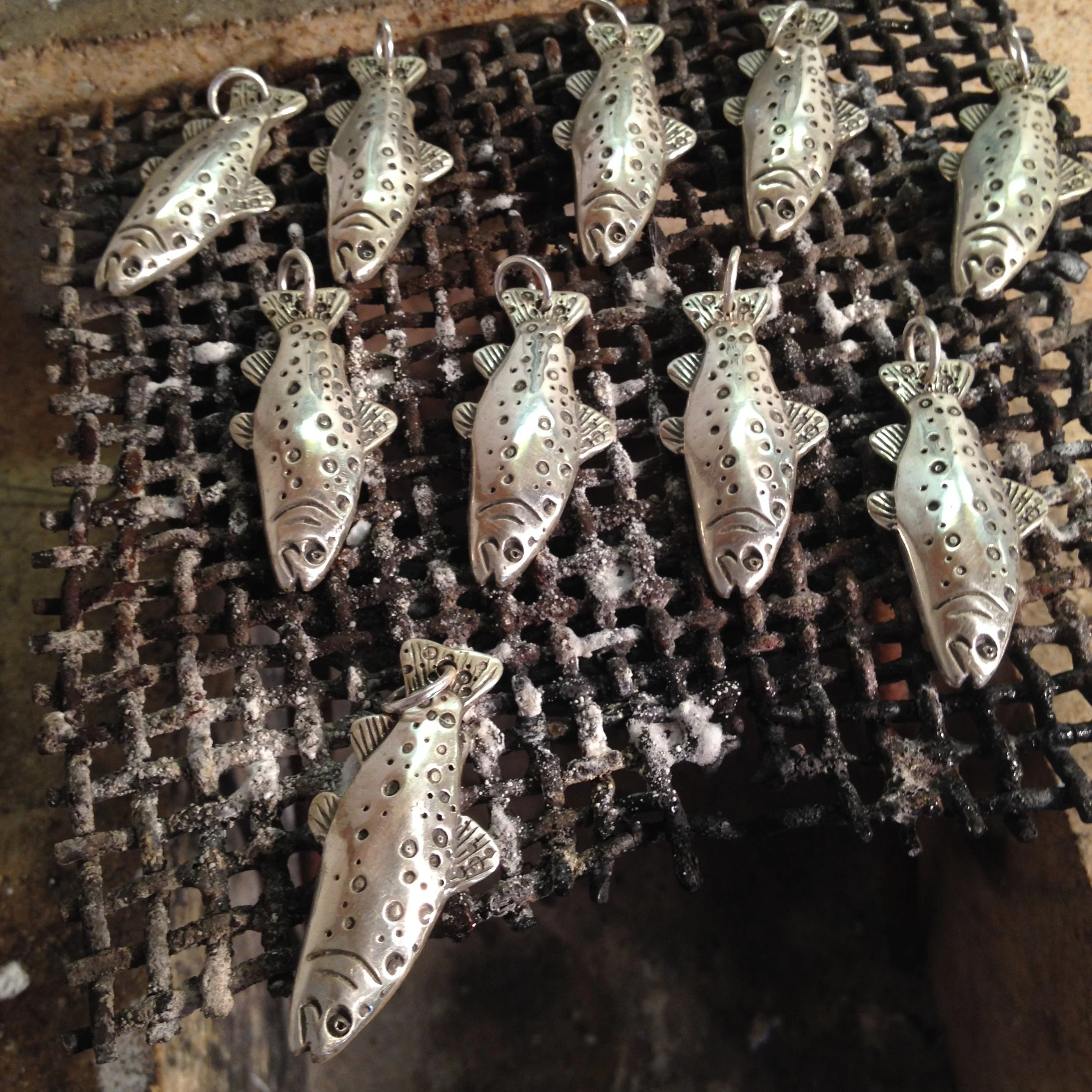 Handcrafted sterling silver trout key chains