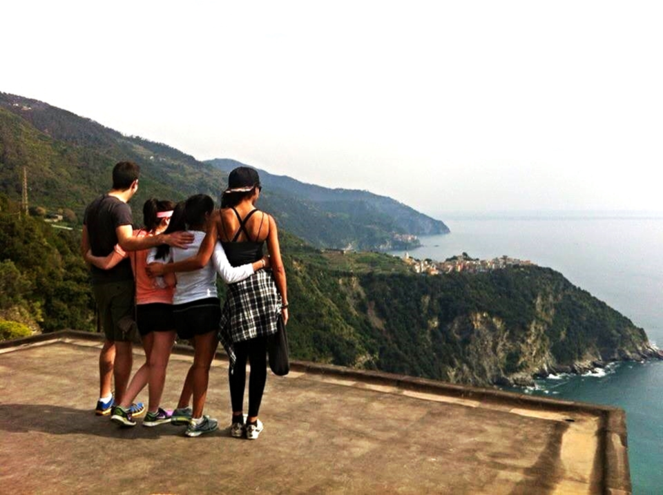 Sharing a beautiful moment with a "stranger" on an abandoned rooftop we stumbled upon while hiking the hills of Italy. He quit his job in Canada to travel across Europe with no plan and no direction. // CINQUE TERRE, ITALY. 