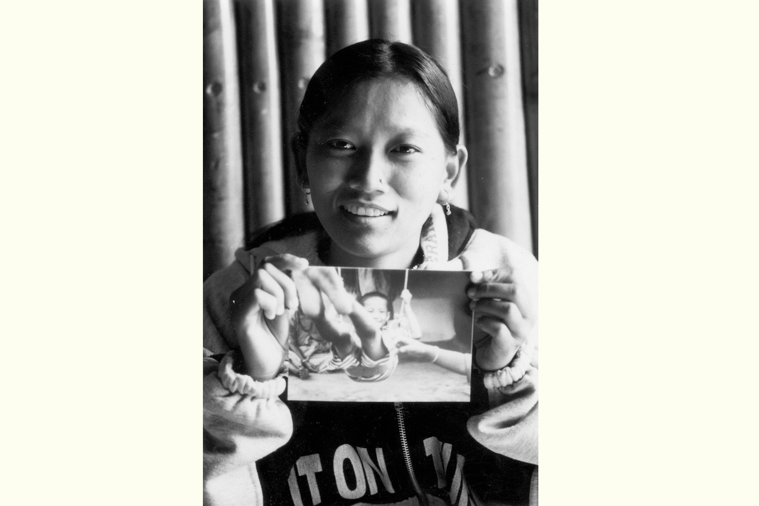 Aite Maya with her photograph, Kathmandu exhibition 2002