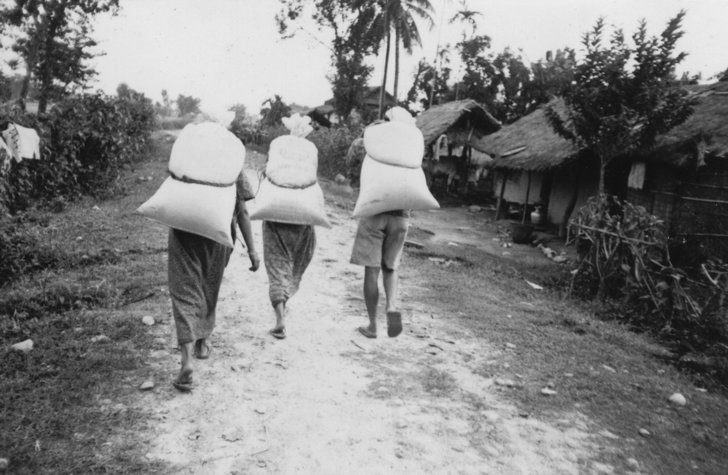 Carrying rations back to the hut. (c) Aite Maya / Rose Class / PhotoVoice