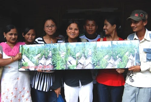 Bhutanese youth show one of their panoramic images of the camp, 2007