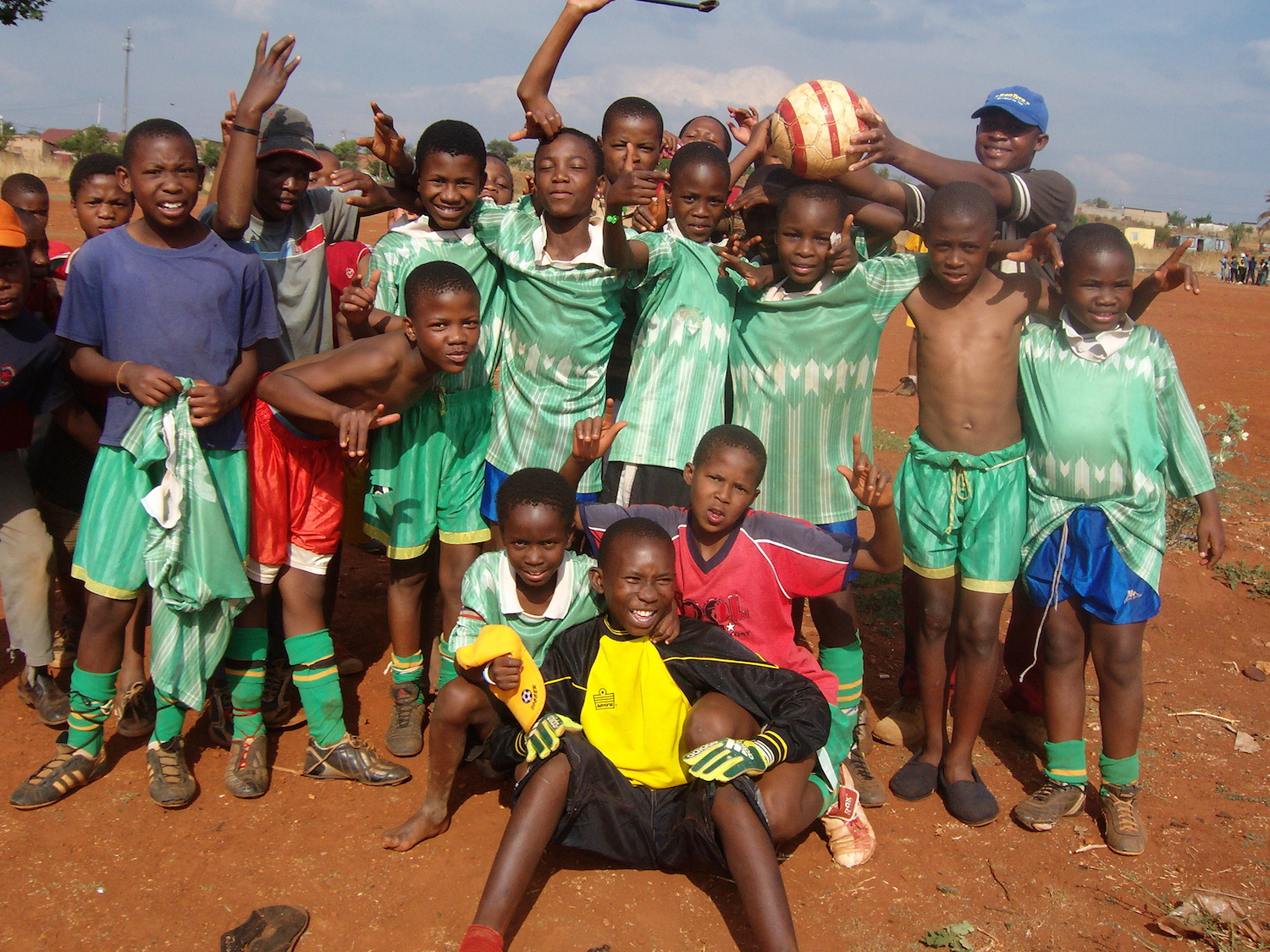  Green Sky, Happy Team. Because of team work they won the game. We need team work as youth to learn new skills and gain confidence to fight the challenges.  © Lebogang/ VRCO/ PhotoVoice    