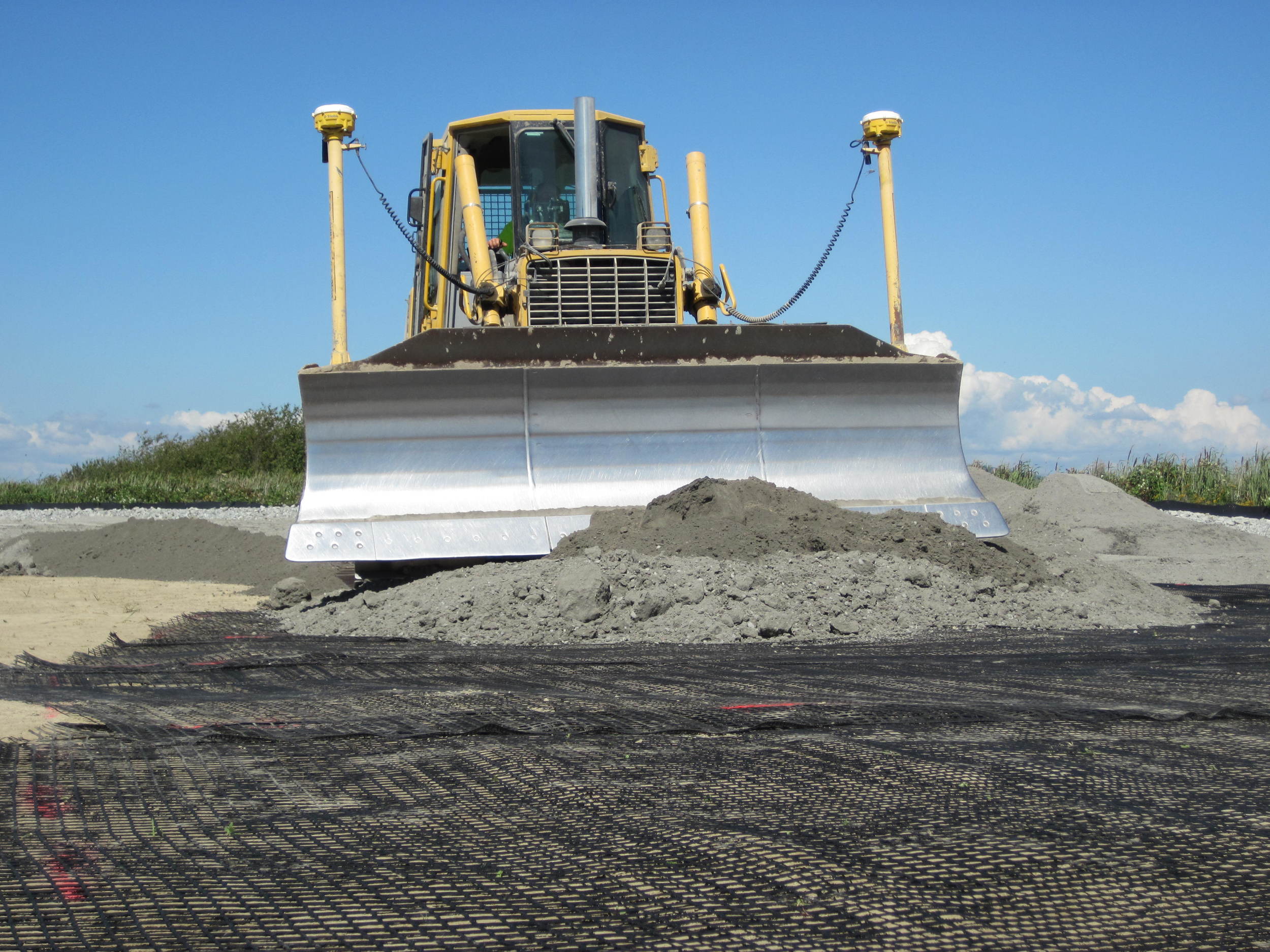  Dike construction begins with geotextile to provide a stable base. (photo by Jenny Baker, TNC)    