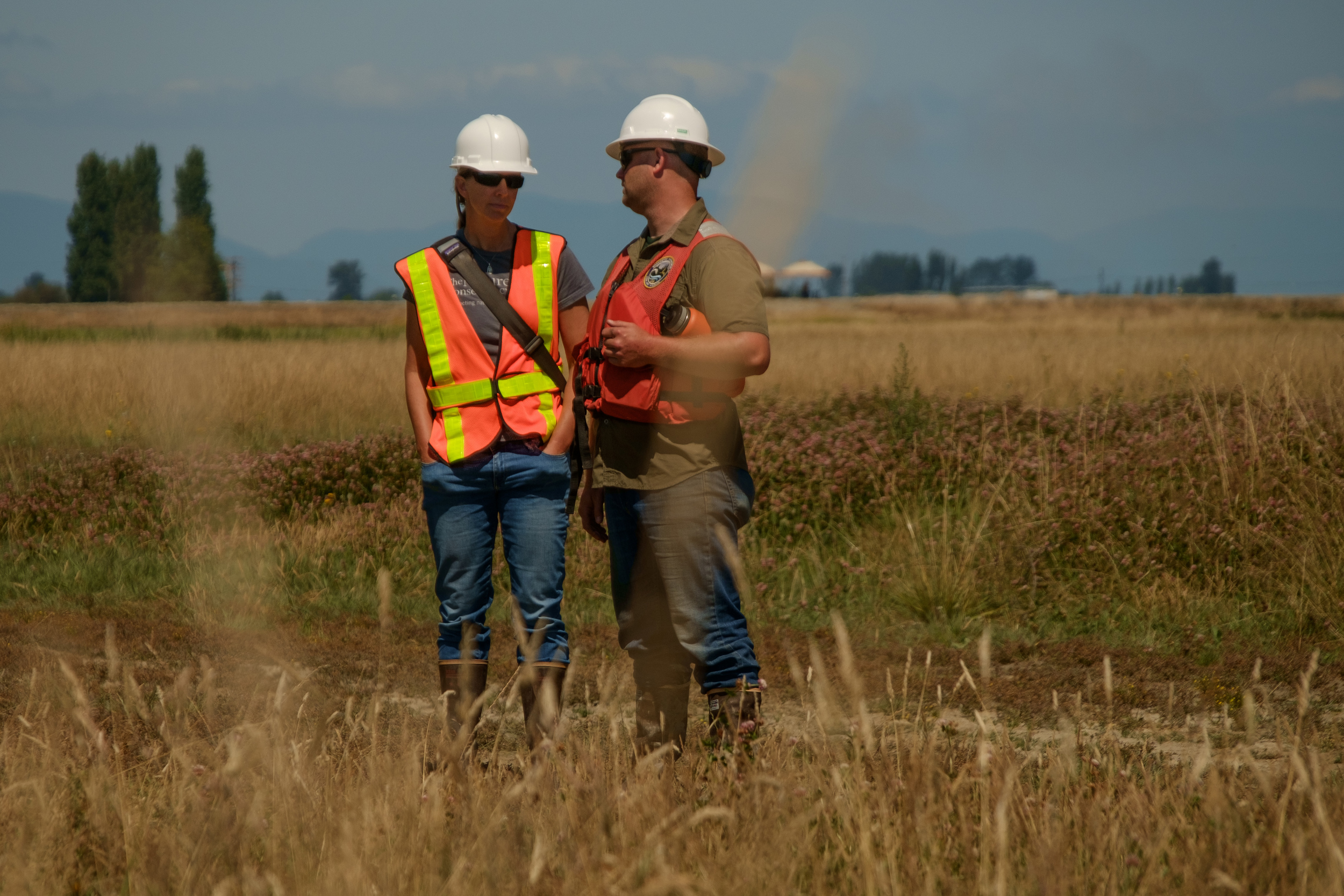  TNC's Senior Restoration Manager, Jenny Baker and WDFW's District Biologist, Andrew Fowler, waiting for the tide to come in.&nbsp; 