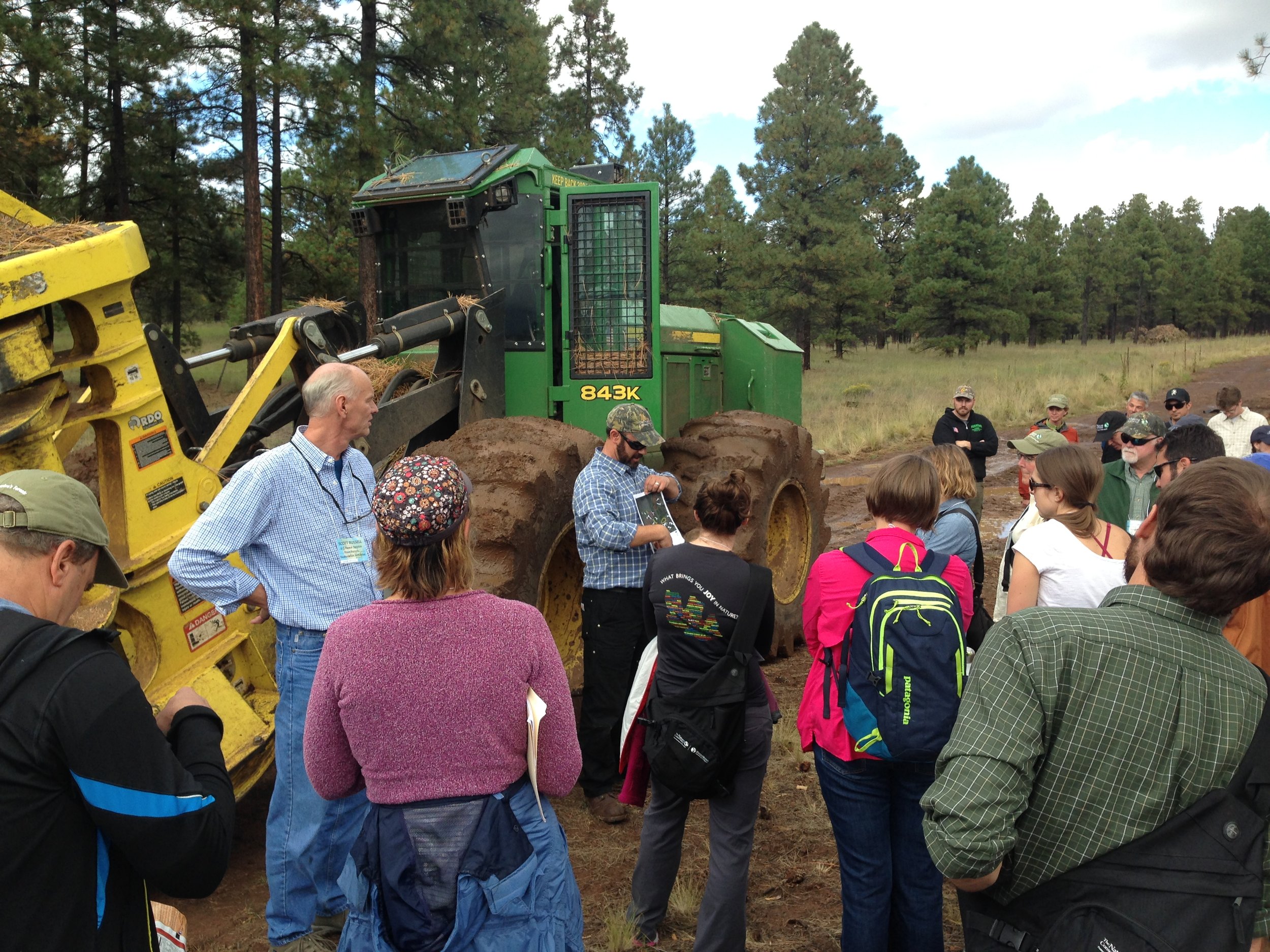  Neil Chapman (TNC- Arizona) describing a forest thinning project using the in-cab technology.&nbsp; 