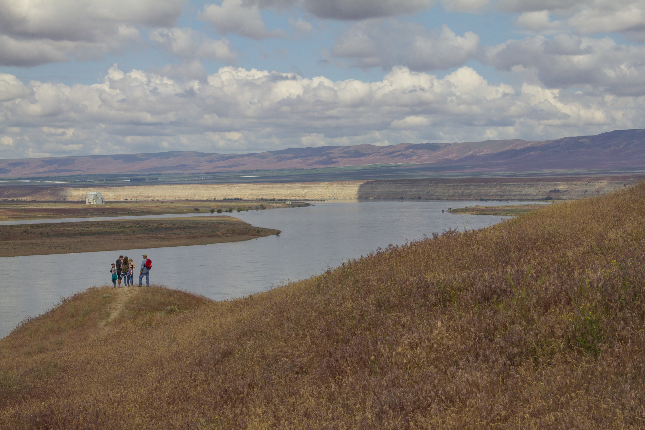 A family enjoys the view above the White Bluffs in the Hanford Reach National Monument. Photo by Joel Rogers.