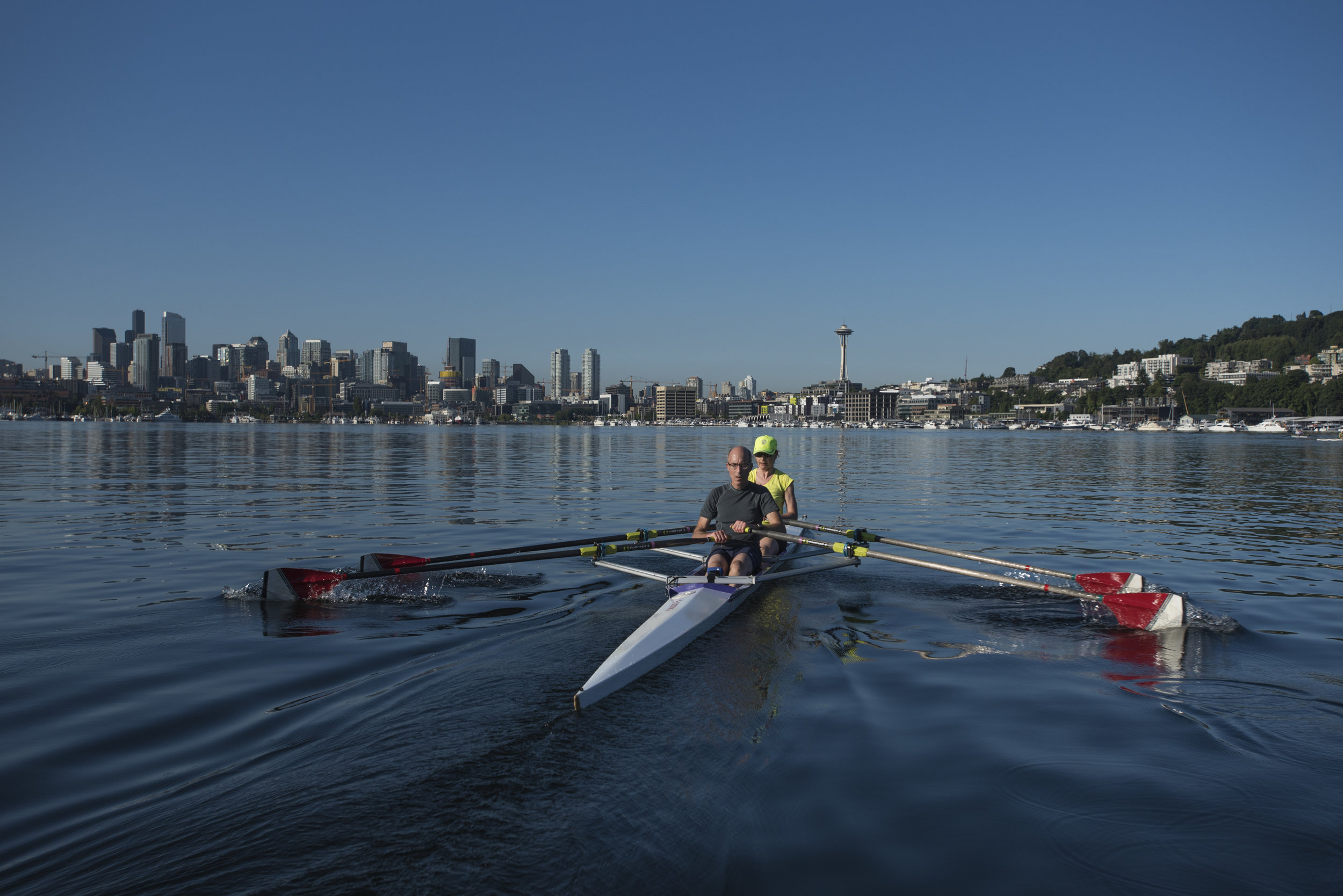  Louise Britton and David Goll &nbsp;rowing on Seattle's Lake Union. Photo by Hannah Letinich. 