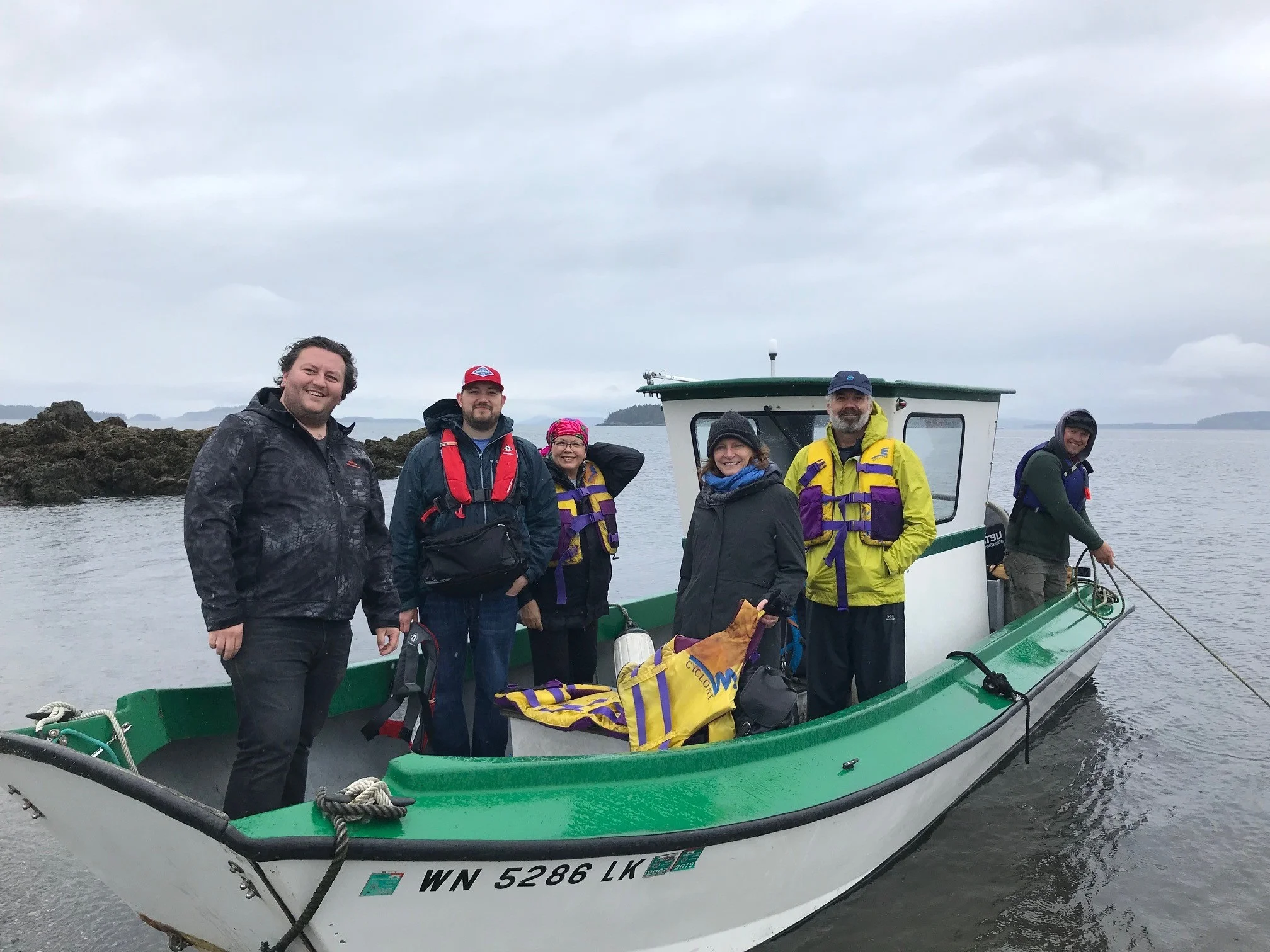 Tulalip tribal members and TNC staff head to the island.