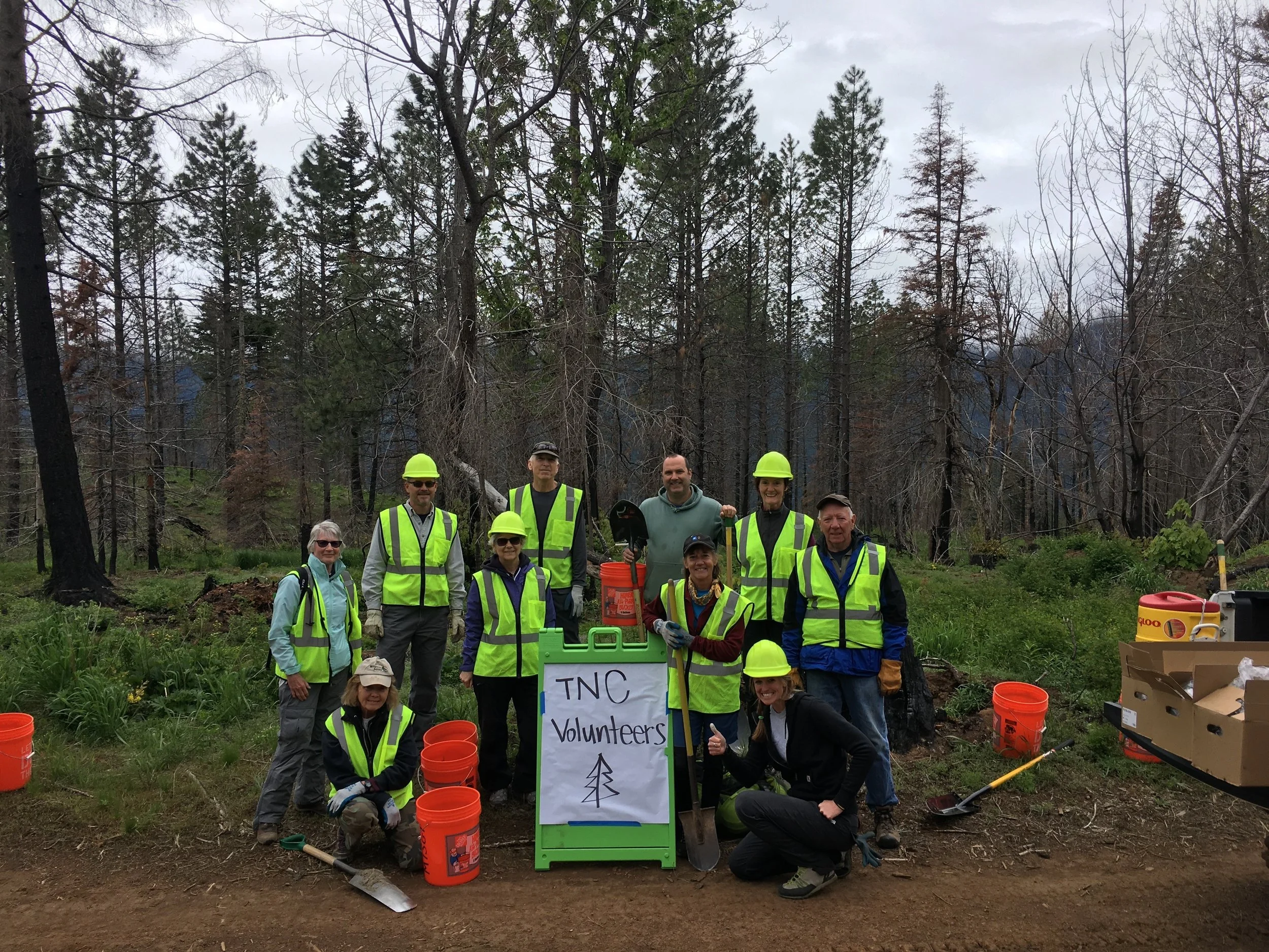 Volunteers after a successful tree-planting day in the rain. © TNC