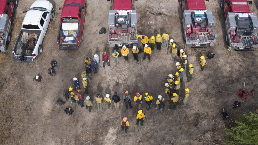 Cascadia TREX participants gather for a morning briefing before a planned burn in 2018. © John Marshall