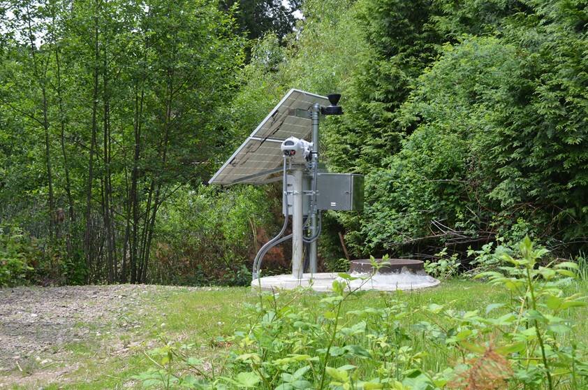 Pictured here is smart, solar-powered Brightstorm sensors and equipment installed at a stormwater retention pond. © Opti