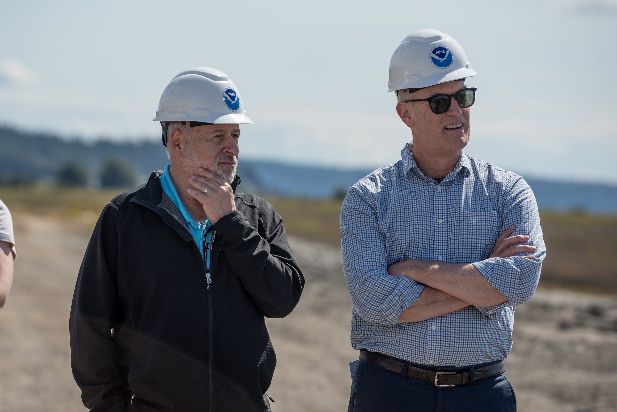  NOAA Administrator Rich Spinrad and Congressman Rick Larsen listen to presenters about how the infrastructure funds are restoring salmon habitat and increasing climate resilience. © Hannah Letinich/TNC 