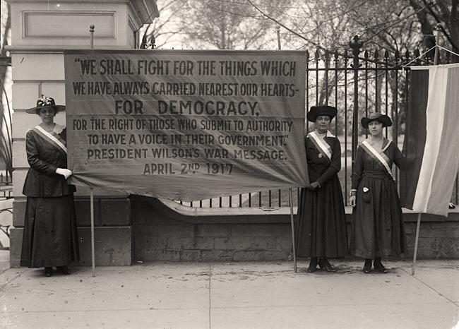 Suffragists from National Women's Party picketing White House