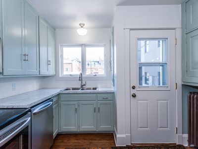 Main floor: Kitchen with additional side entrance to the home