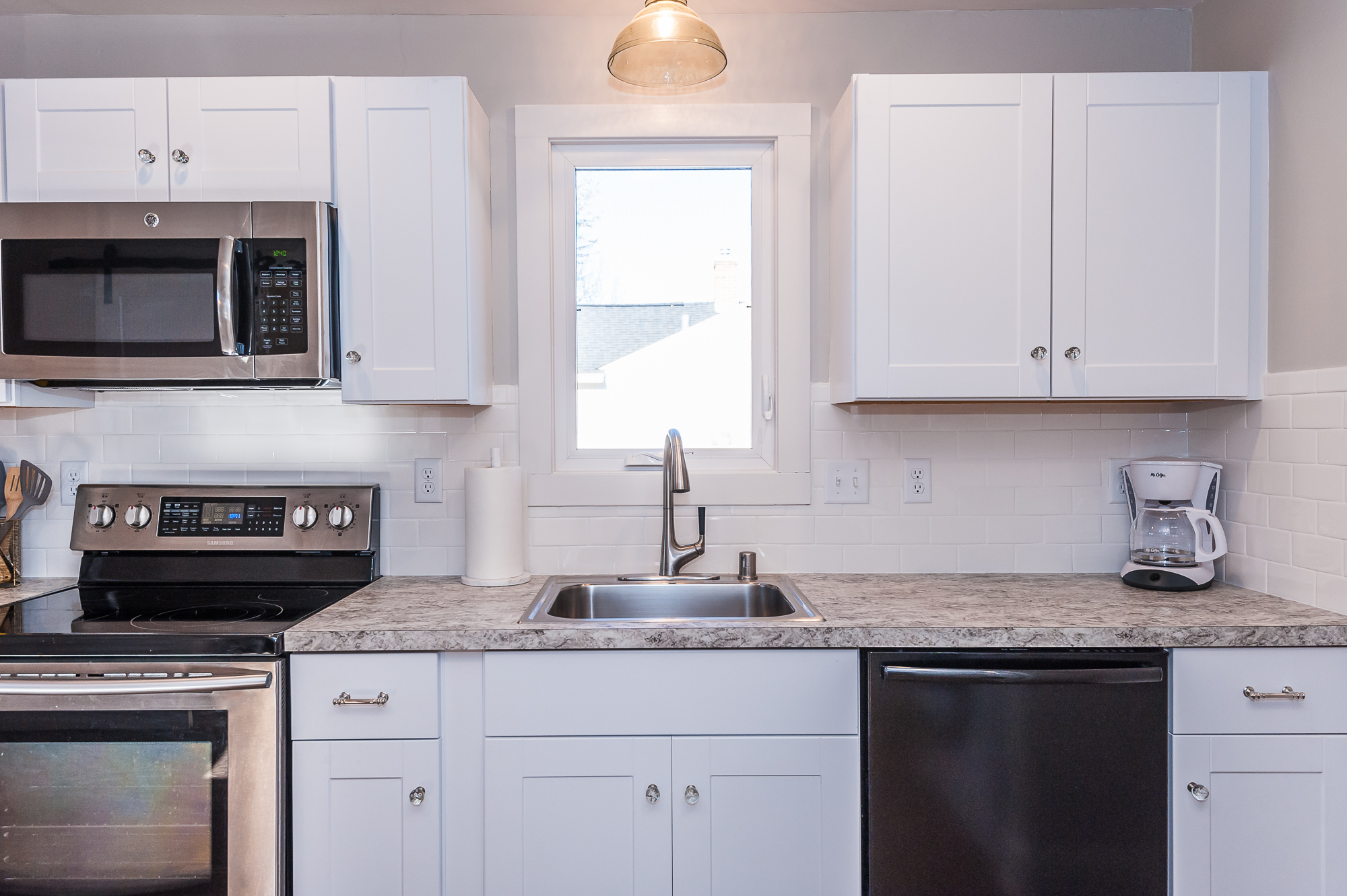 Stainless steal appliances and fully stocked with all you'll need for cooking at home. 