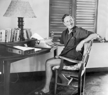 Ian Fleming working at Goldeneye, his home in Jamaica.