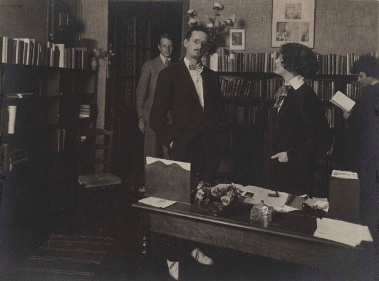 James Joyce with Sylvia Beach (center), John Rodker (left) and Cyprian Beach (right) at Shakespeare and Company, 1921 (Image courtesy of the Poetry Collection of the University Libraries, University at Buffalo, The State University of New York.)
