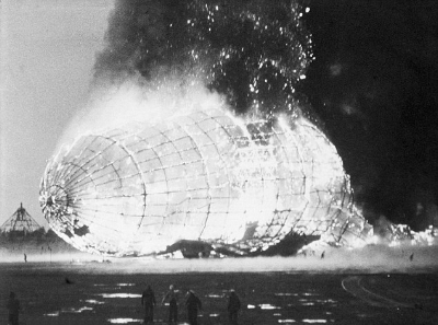 The Hindenburg ignited and was consumed by flames in seconds, killing 36.