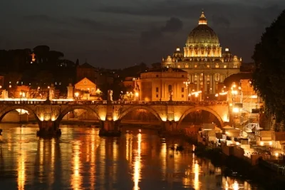 The Tiber River flows and glows through Rome.
