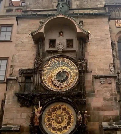 The Astronomical Clock with the Apostles parading past the upper windows.