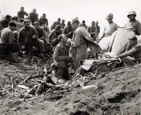 Reportedly Lt. Charles Suver saying Mass atop Mt. Suribachi during the invasion of Iwo Jima, February 23, 1945.