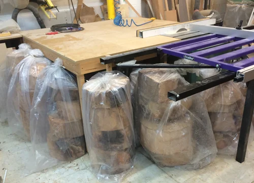 Once cut into disks it's important to keep the wood stored in plastic to prevent it from drying out too quickly which can result in cracks and splits and ruin the wood. Green wood is also much easier to work with than dried wood.