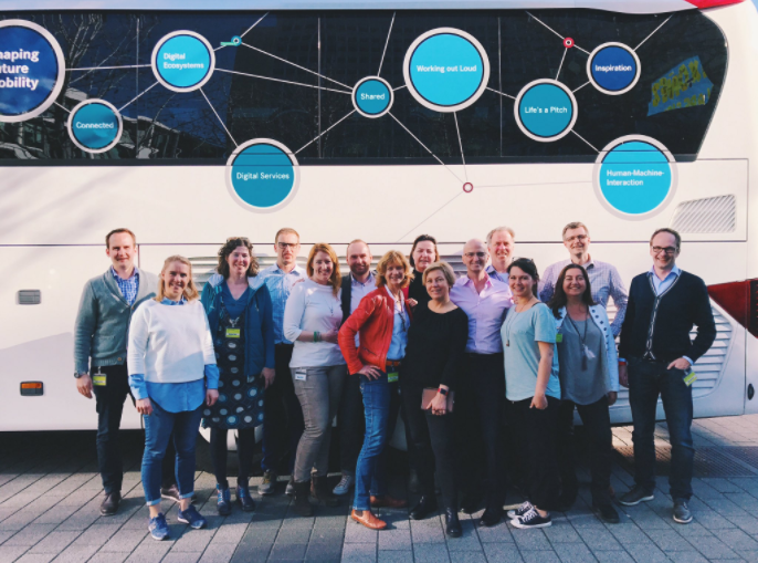 In front of Daimler's Digital Life bus. (First time "Working Out Loud" is on the side of a bus!)