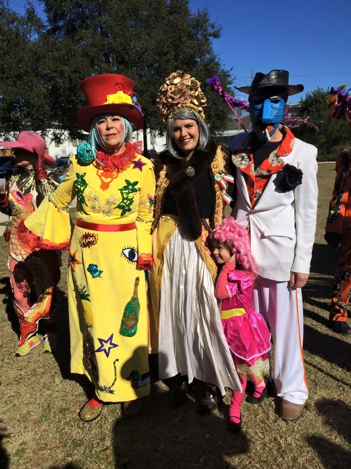 Kate, her daughter, son-in-law, and granddaughter on Mardi Gras day, at the start of the St. Cecilia parade. 