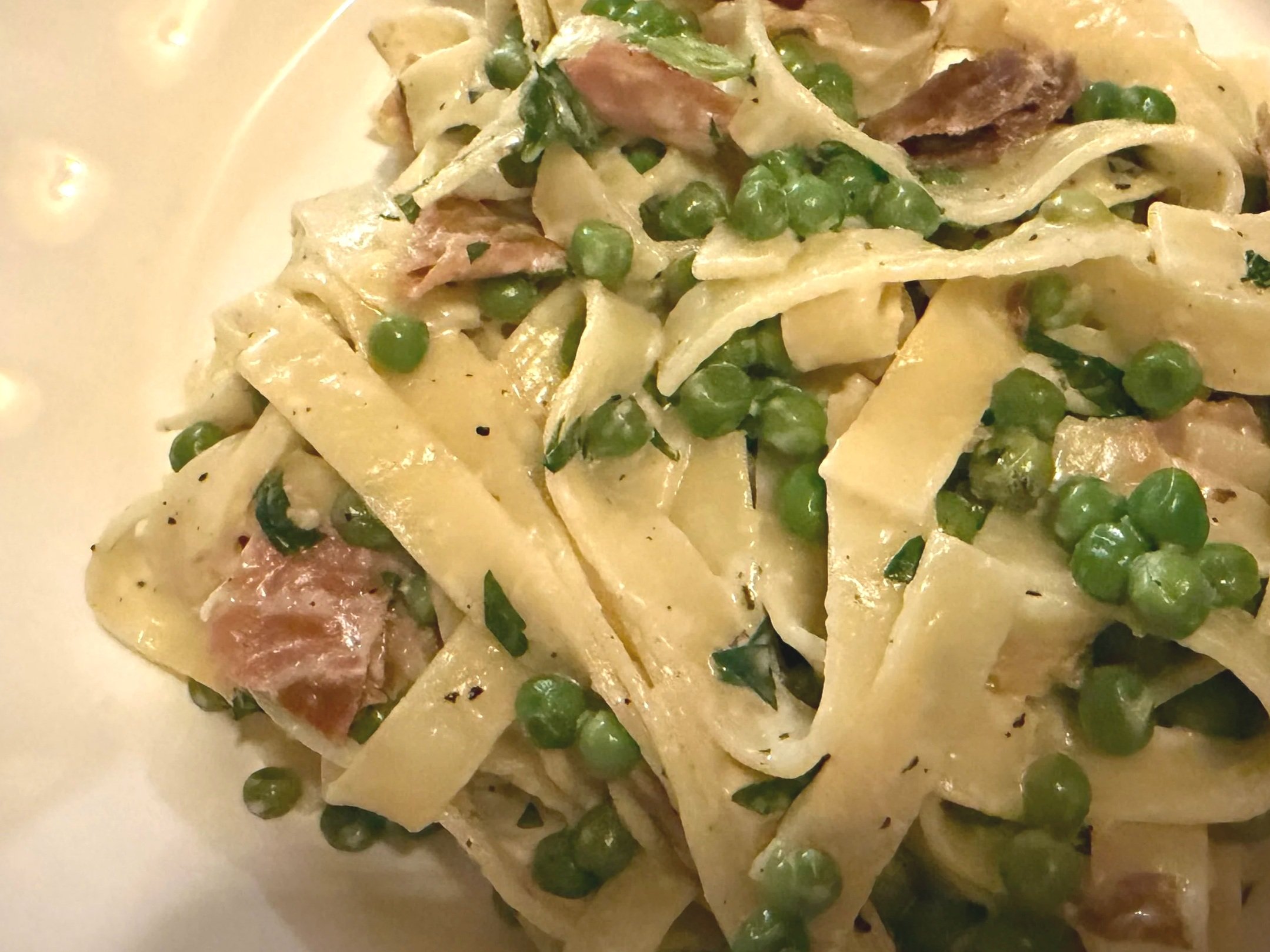 Truffle-Infused Cream Pasta With Peas and Ham