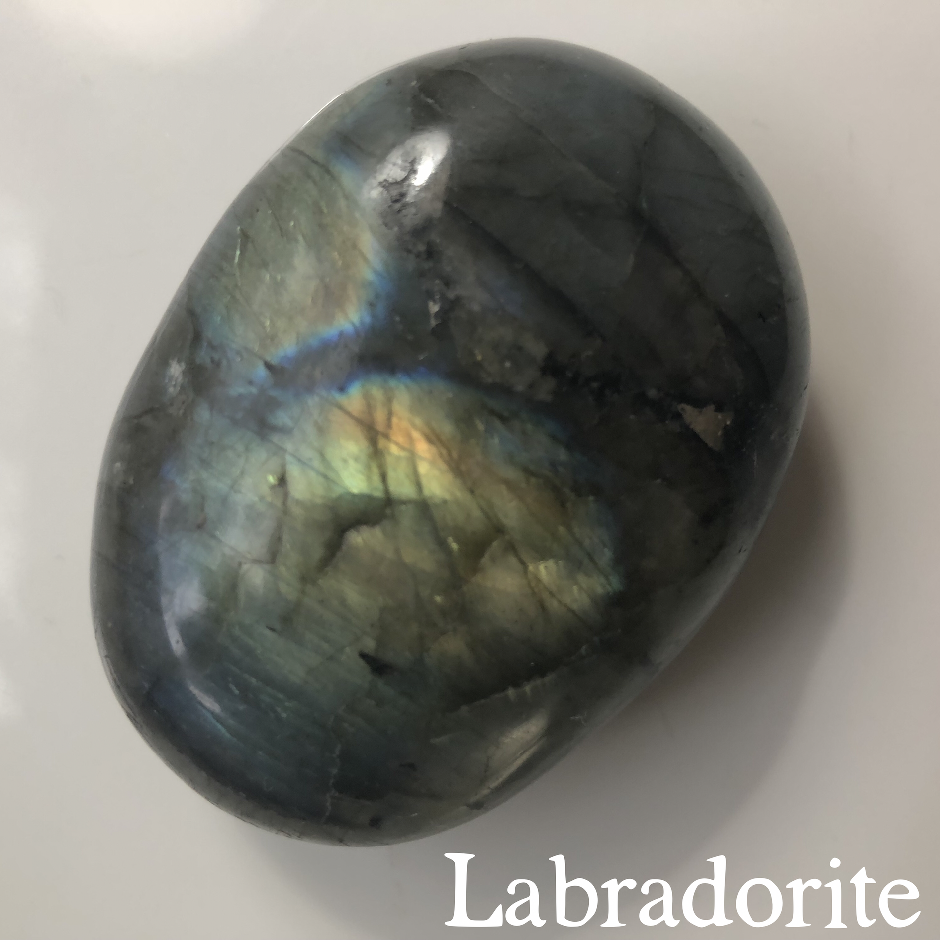   Labradorite ($9.00) :&nbsp; This guy is fly.&nbsp; According to legend, a bit of the aurora borealis was trapped in a rock, and labradorite was born.&nbsp; The little paper I was given with my purchase (helpful—that way, you don’t have to take pict