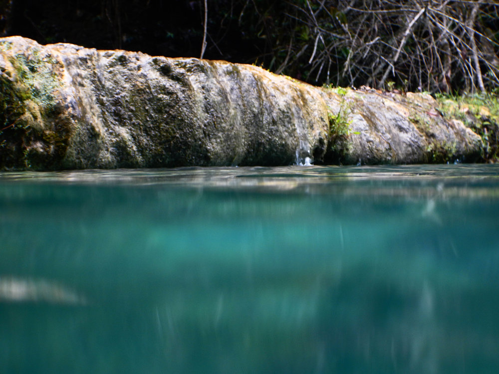 in water close up of rocks.jpg