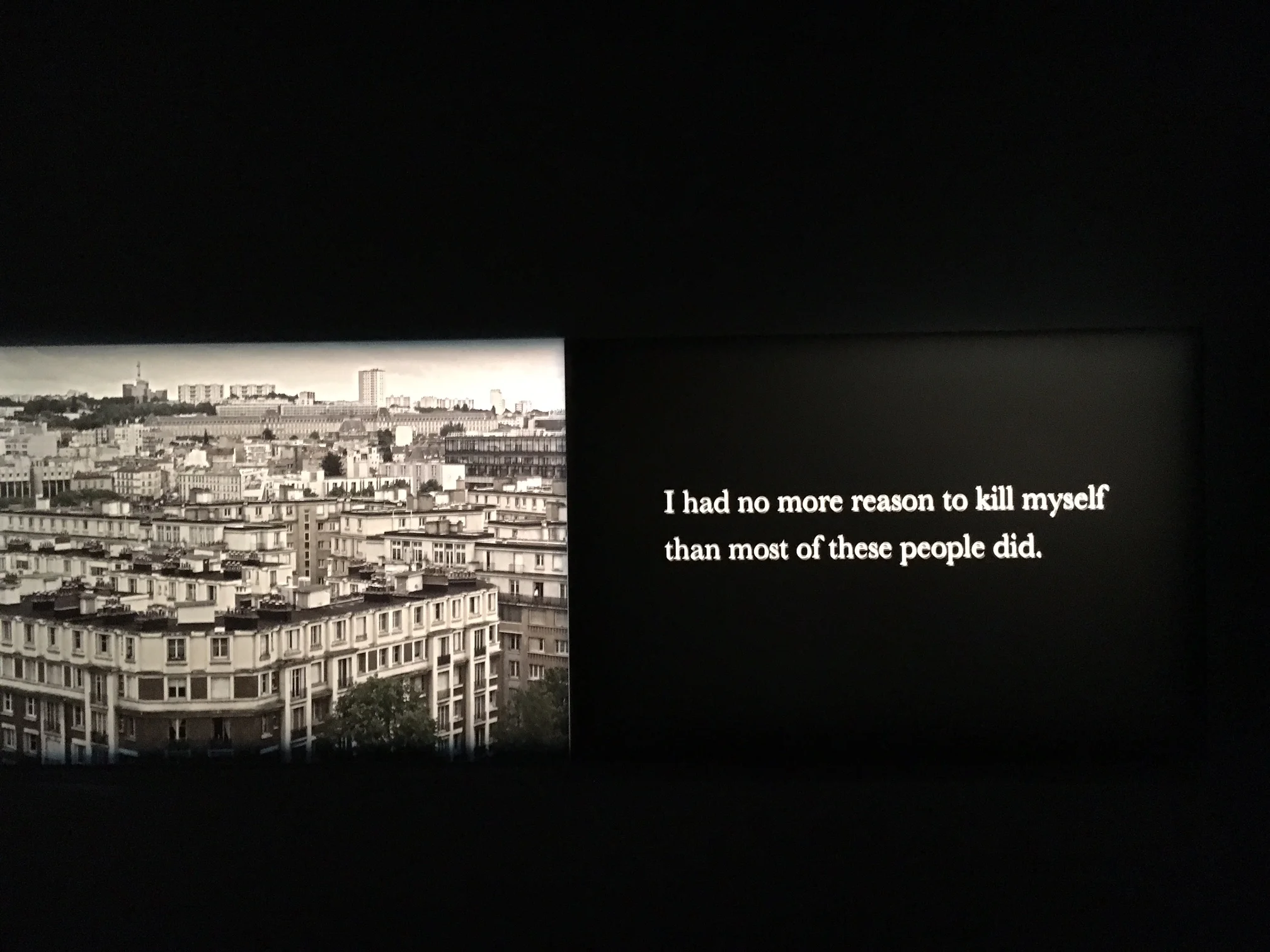 A phrase from Houellebecq’s 2015 novel, Submission: "I had no more reason to kill myself than most of these people did,” on the right panel of a large triptych at "Michel Houellebecq: French Bashing" art exhibit in New York. Photo Credit: Joel Whitn…