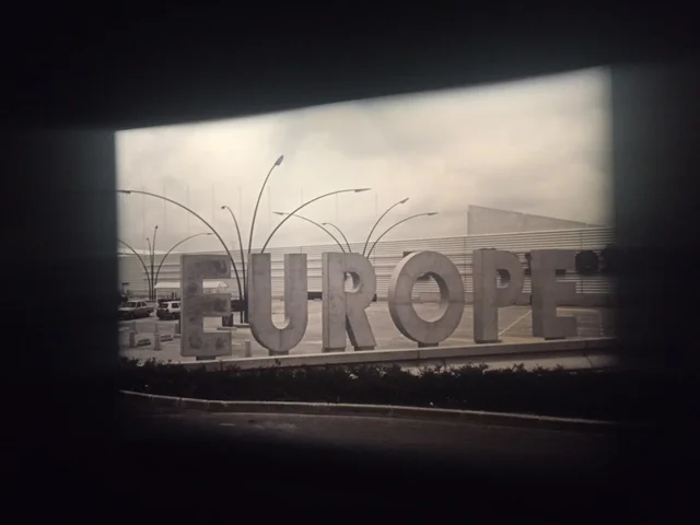 Photograph of crumbling concrete sign of the word "EUROPE" at the "Michel Houellebecq: French Bashing" exhibit in New York