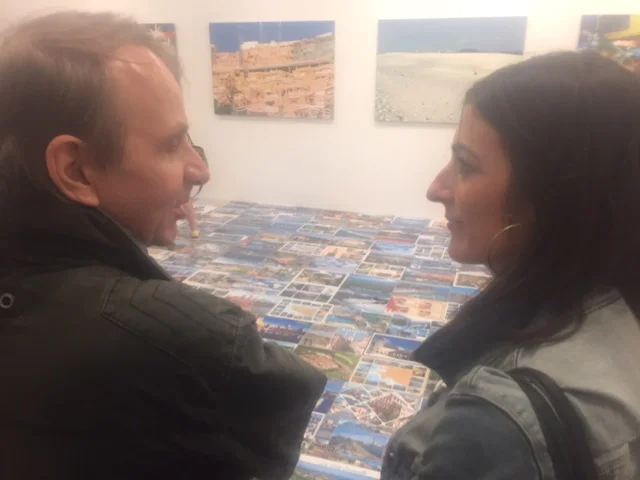LSP's host Prune Perromat with French lit star Michel Houellebecq commenting his art at the opening of his show "French Bashing" on Friday in New York. Photo Credit: Joel Whitney