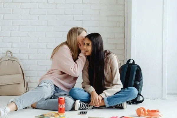 Teen girls sitting on the floor