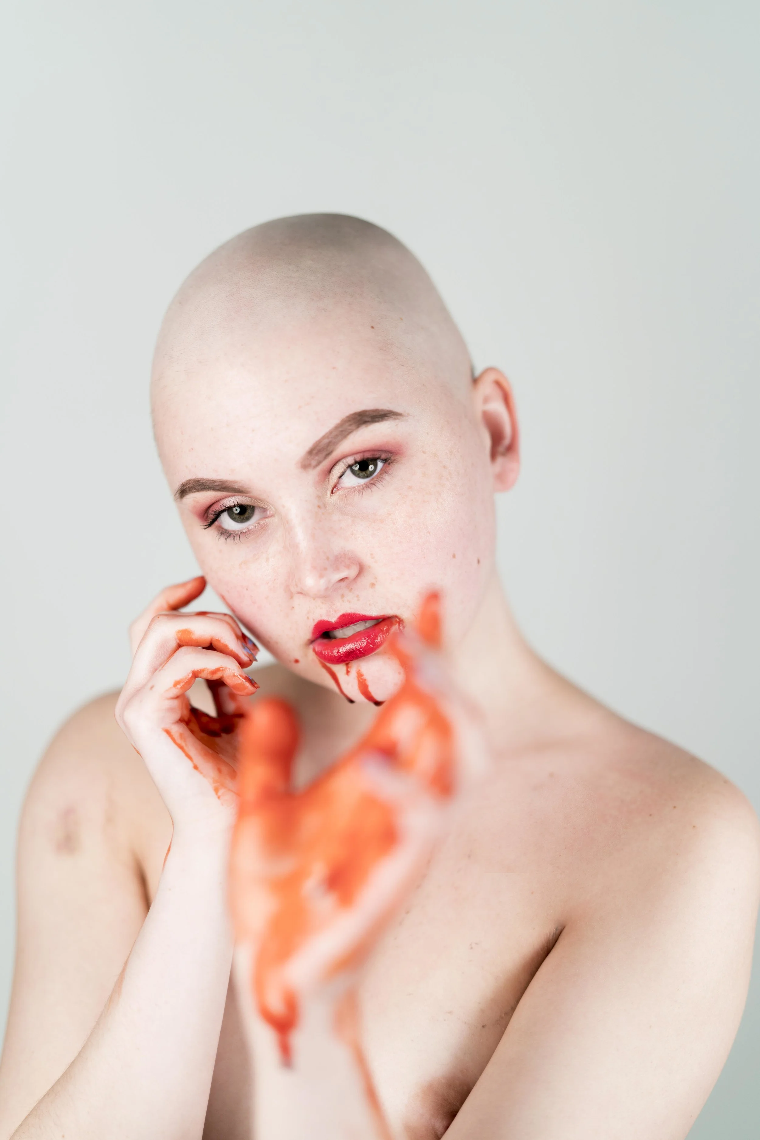 Red <p> Like our love <p> My veins still have remains <p> Something I cannot get rid of <p> And it’s you