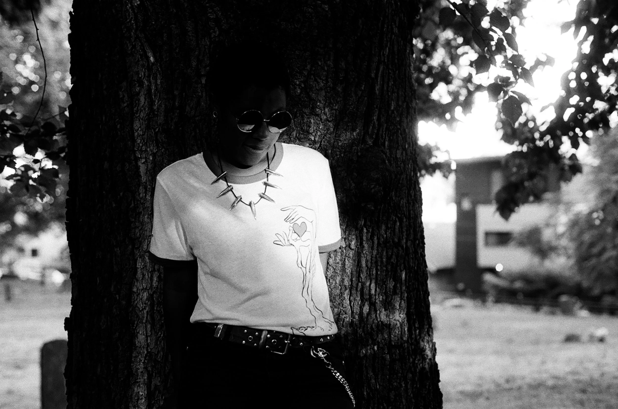 unisex red/white vintage ringer tee shirt with hands growing like a tree holding a red heart graphic - dfrntpigeon