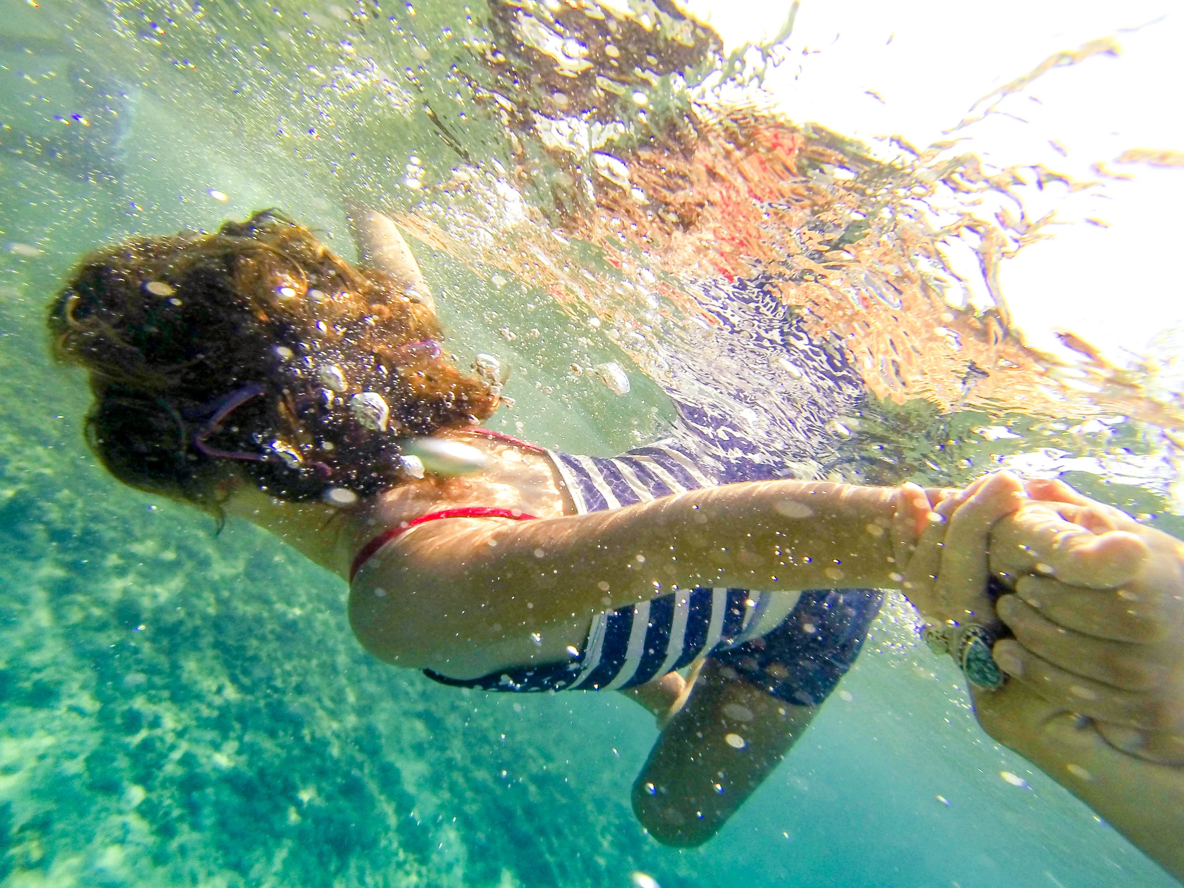This is 4-year-old Isa. Born a fish, she loves to be immersed in the ocean. This is what a "Blue Minded" future looks like.