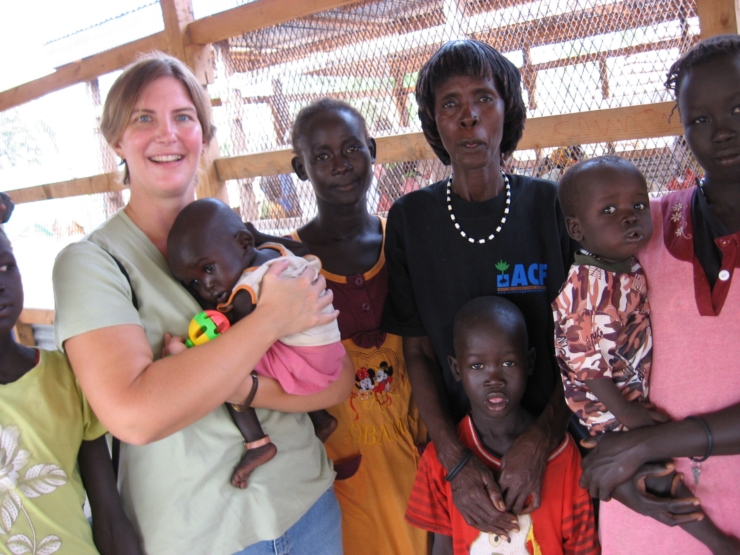 Sonya with several women and babies during a nutrition program in South Sudan.