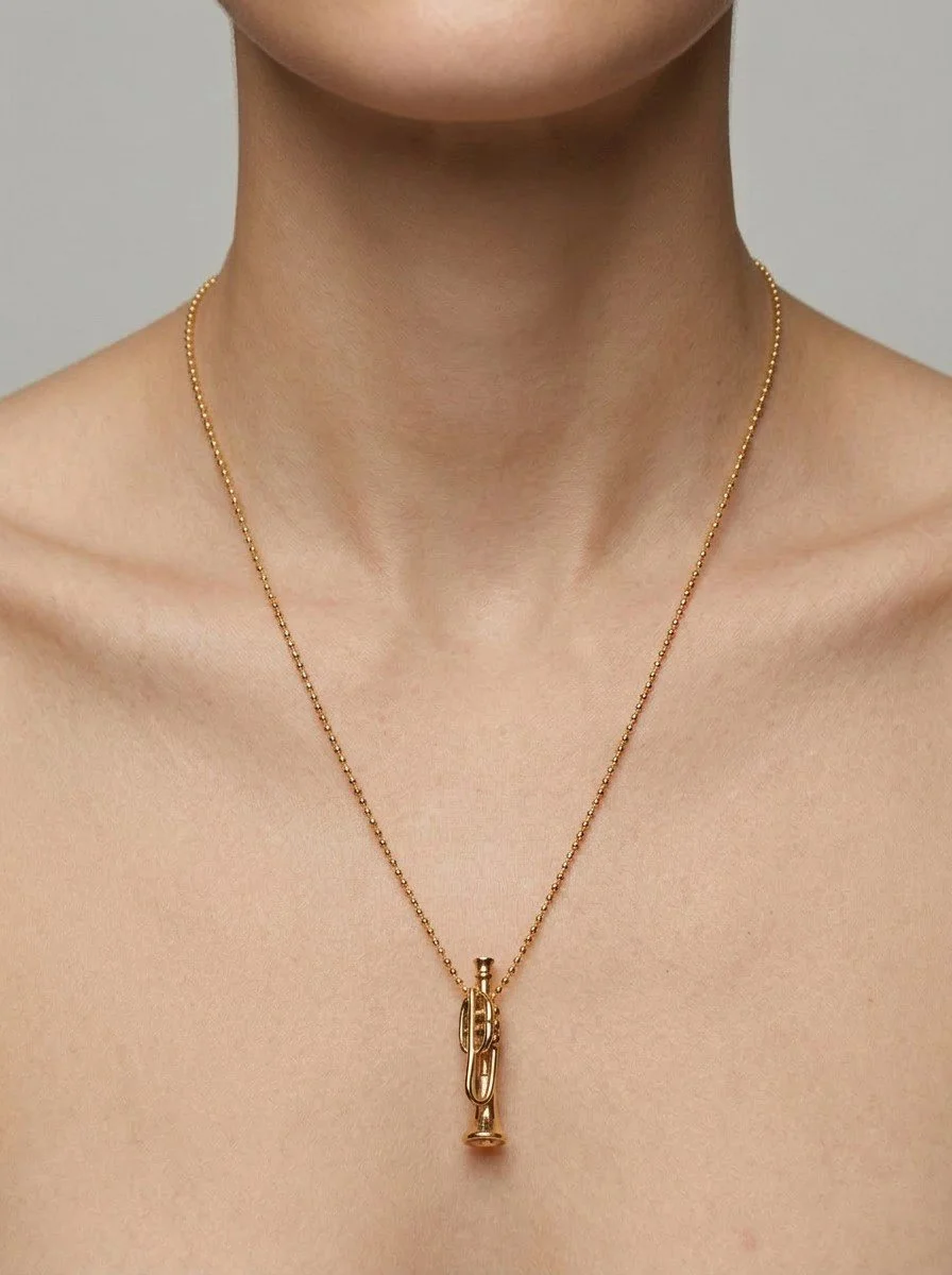 A_close_up_of_a_person_s_neck_c-1.jpg