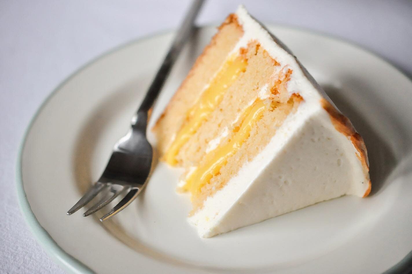 Simple, elegant, DELICIOUS. Our Lemon Curd Cake is triple lemony &ndash; lemon cake layers filled with fresh lemon curd, topped with lemon zest cream cheese icing. Perfect for springtime, and perfect for your mom this Mother's Day! This (and all of o