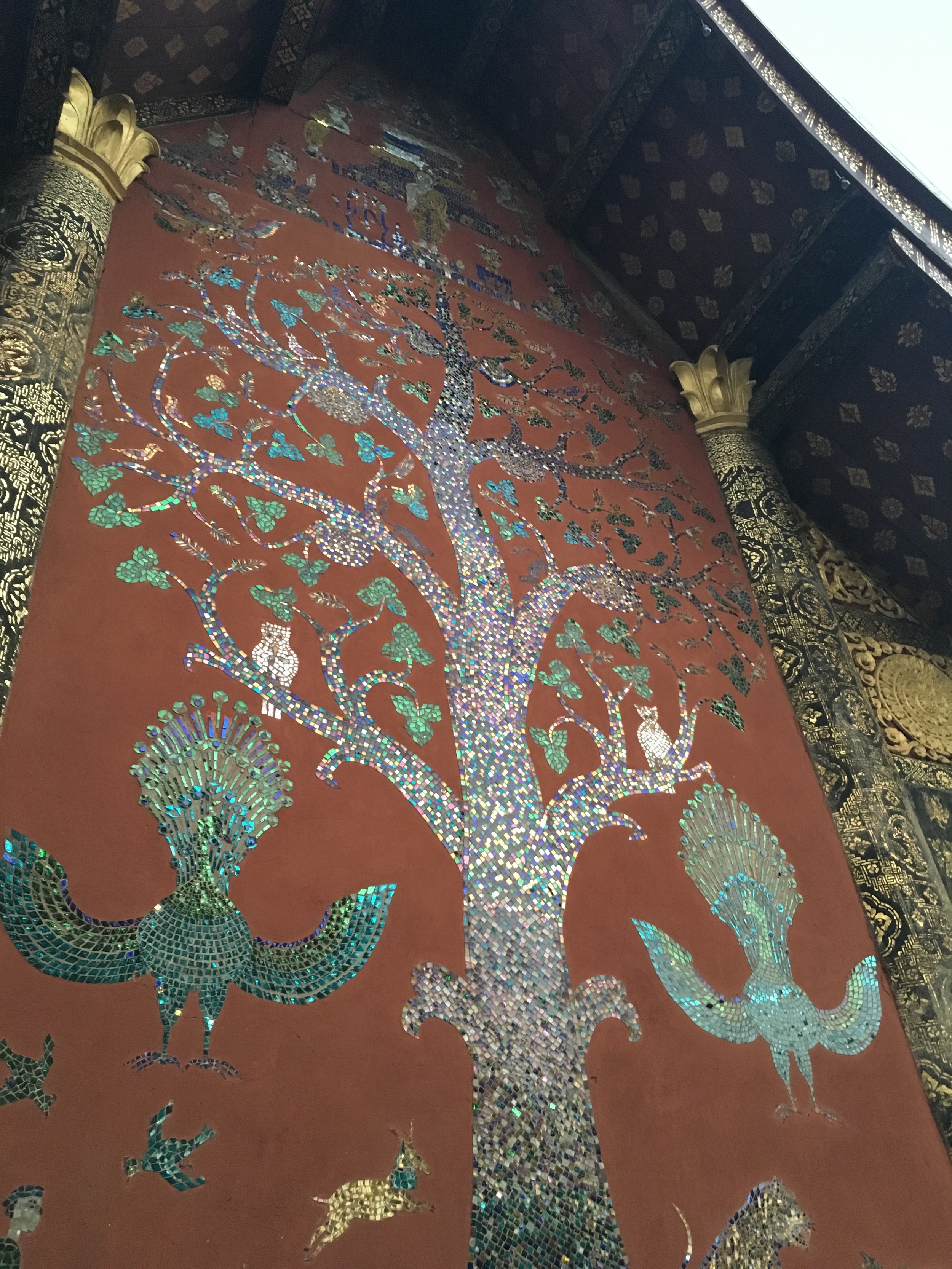 Beautiful tile mosaics at Wat Xieng Thong