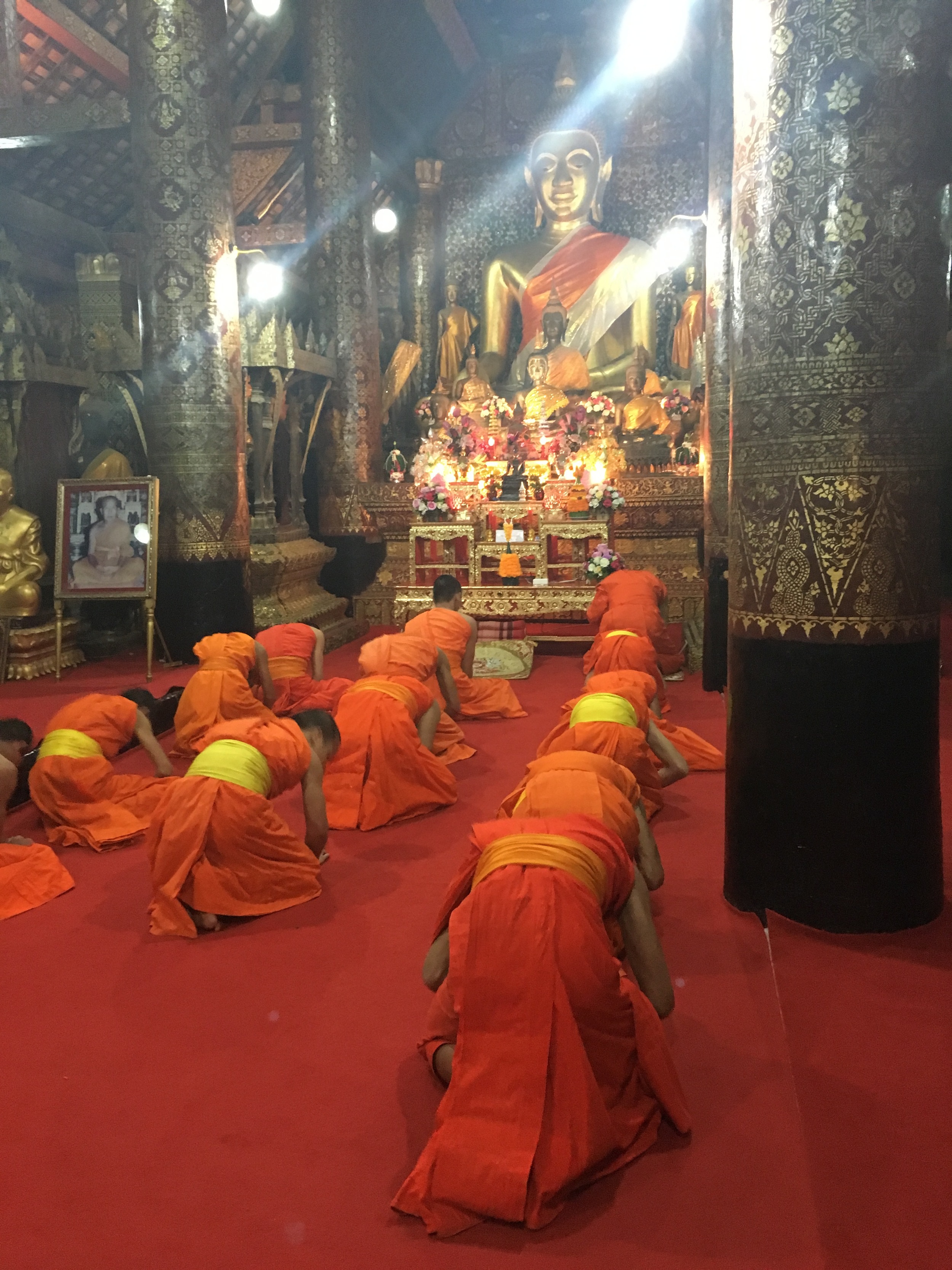Evening prayer at Wat Xieng Thong