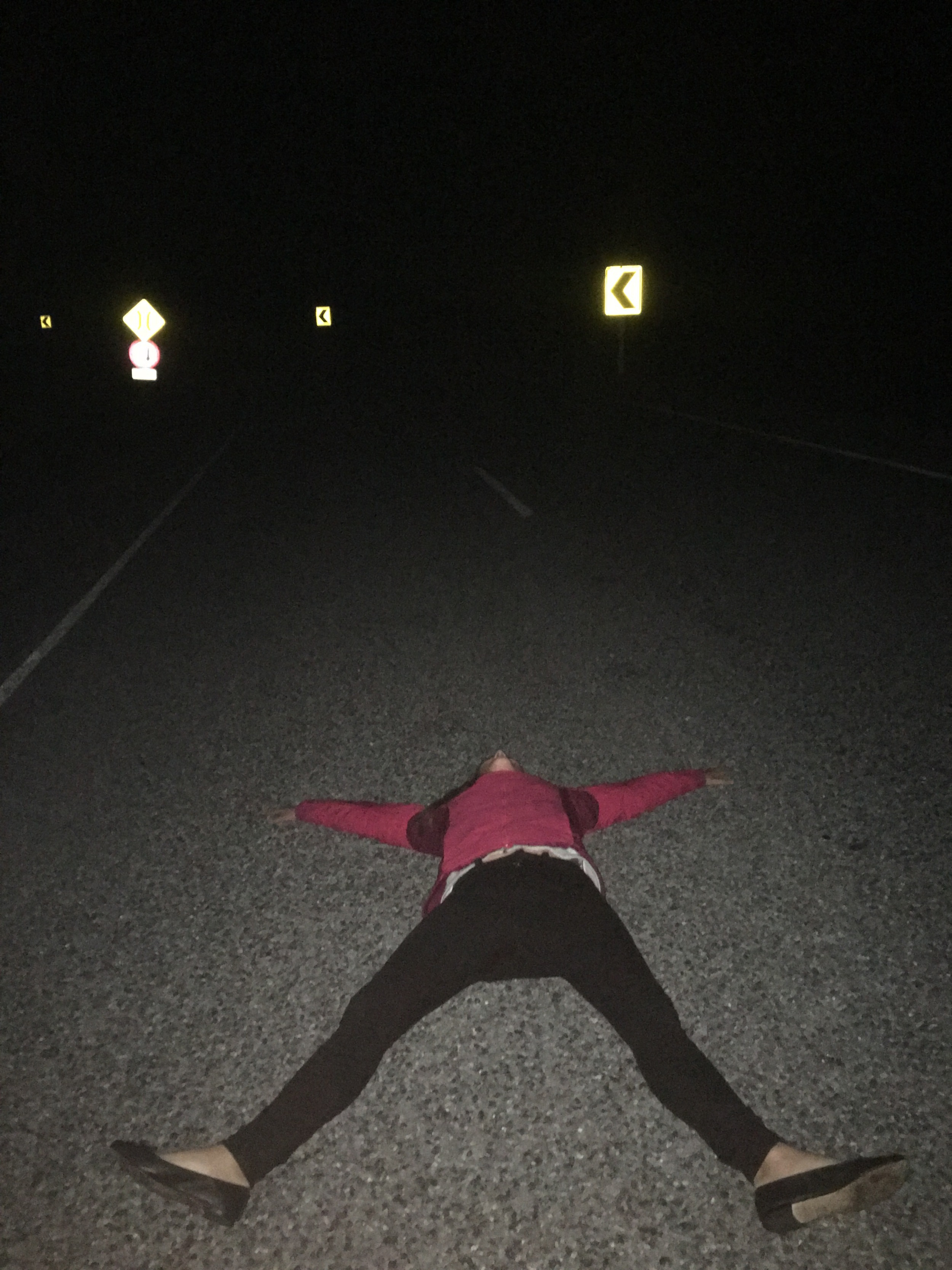 Lying in the middle of the road, looking at the Milky Way