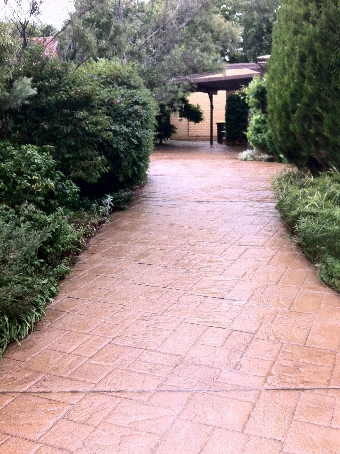 stamped-concrete-driveway-cleaning-sealing-after-canberra.jpg
