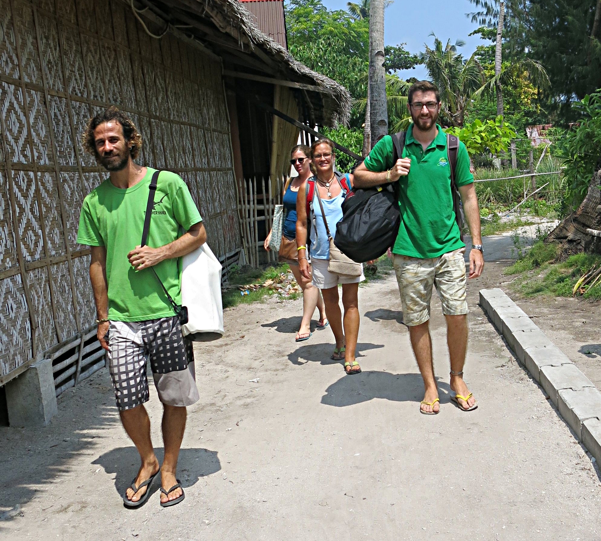 Walking the beat and carrying my dive kit back from assessment on on of the less sandy roads of Malapascua