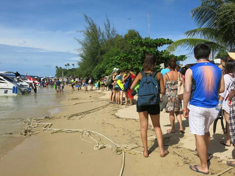 Tourists lining up in Ao Chalong for day trips to nearby islands. Up to 1000 people a day in high season.