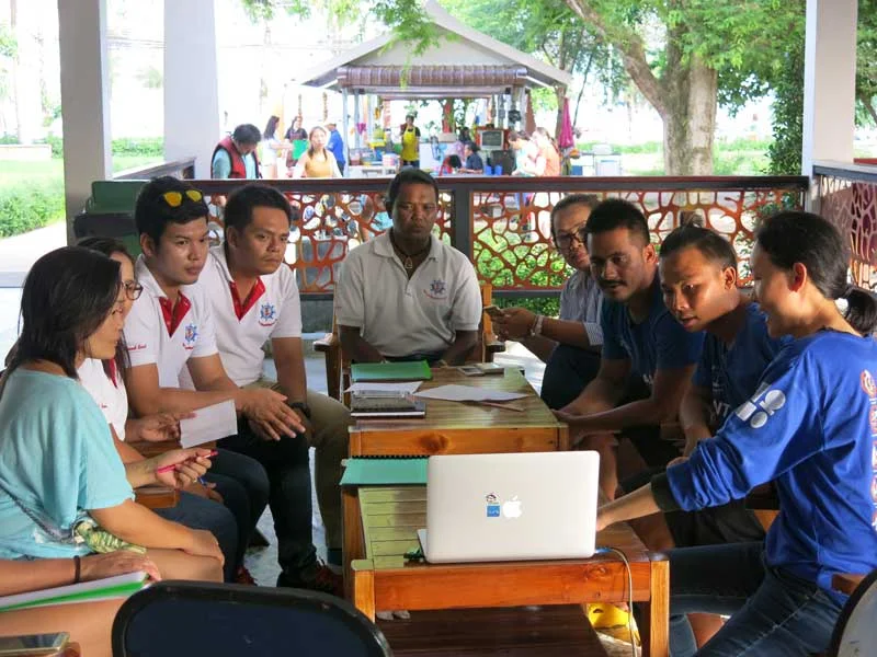 Newly trained Green Fins Assessors Maw and Kaew deliver the GF Awareness Raising presentation to senior management of a snorkel tour company.