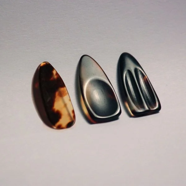 Left to right: No indent, concave groove, double groove.